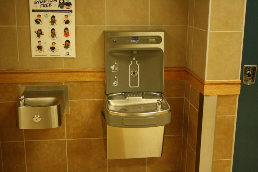 Two water fountains, one equipped with a water-bottle filling station